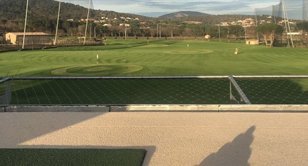 Flagstaff Synthetic turf beside natural grass golf course