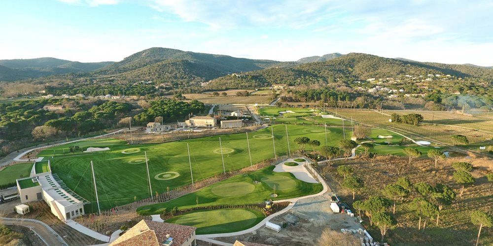 Flagstaff Aerial view of a synthetic grass golf course surrounded by hills